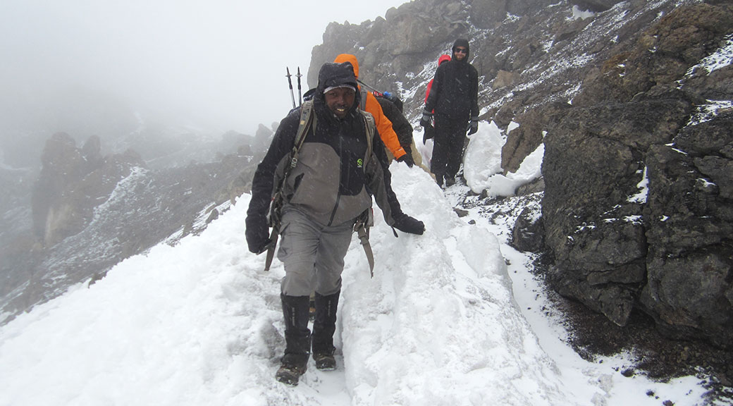 taking tourists onto Mt Kilimanjaro